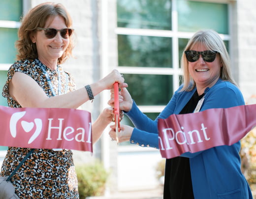 Lisa Yohalem and Jeannine Erickson Grinnell at the ribbon cutting ceremony. 